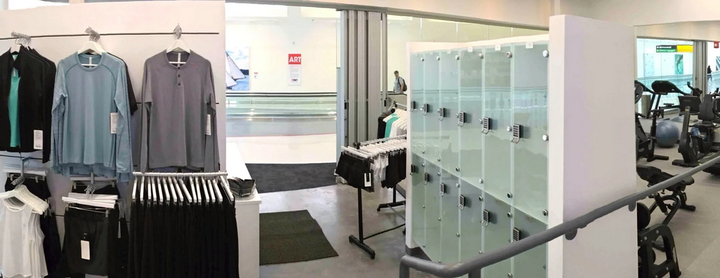 lockers, clothing for sale, and exercise machines.