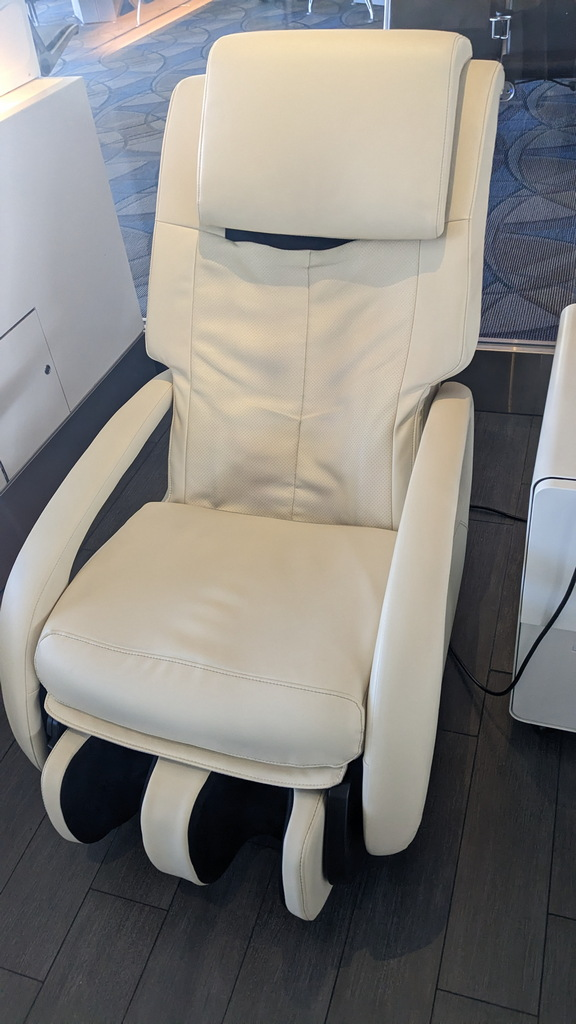 standard white leather massage lounger chair.