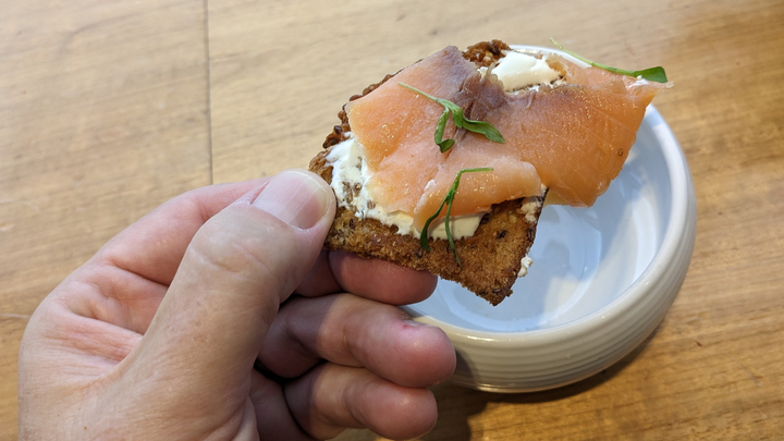 smoked salmon served on crackers.