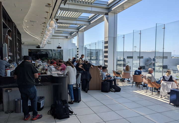 sky deck bar and seating with people relaxing