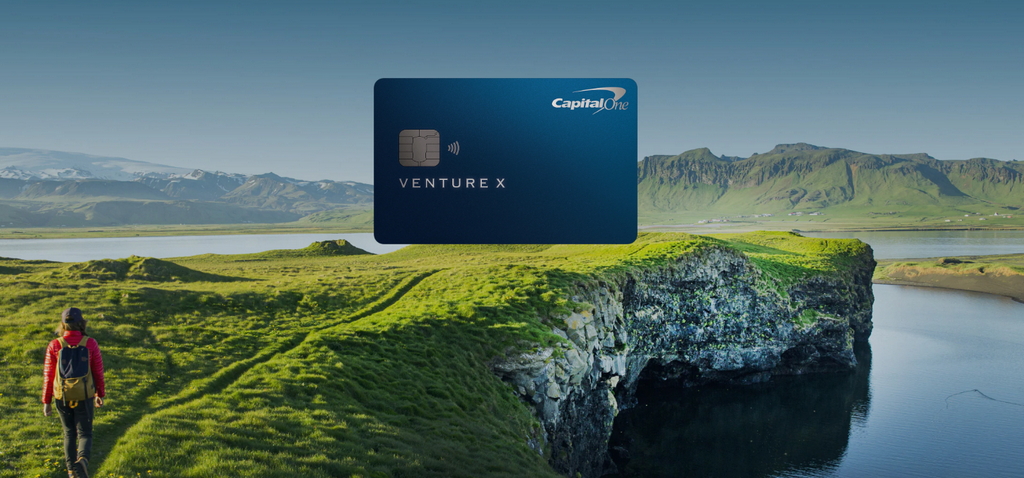 mountains and a person hiking with image of Venture X credit card