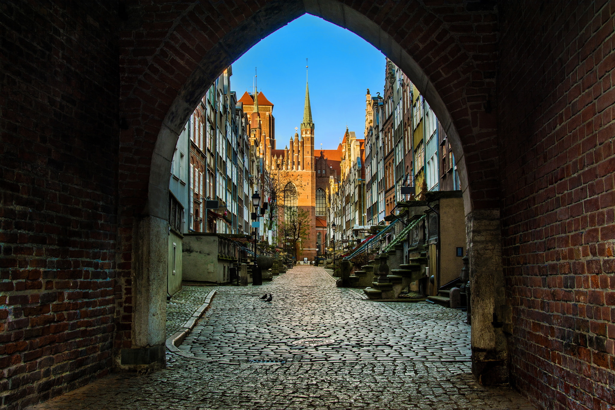 view of city through a tunnel.