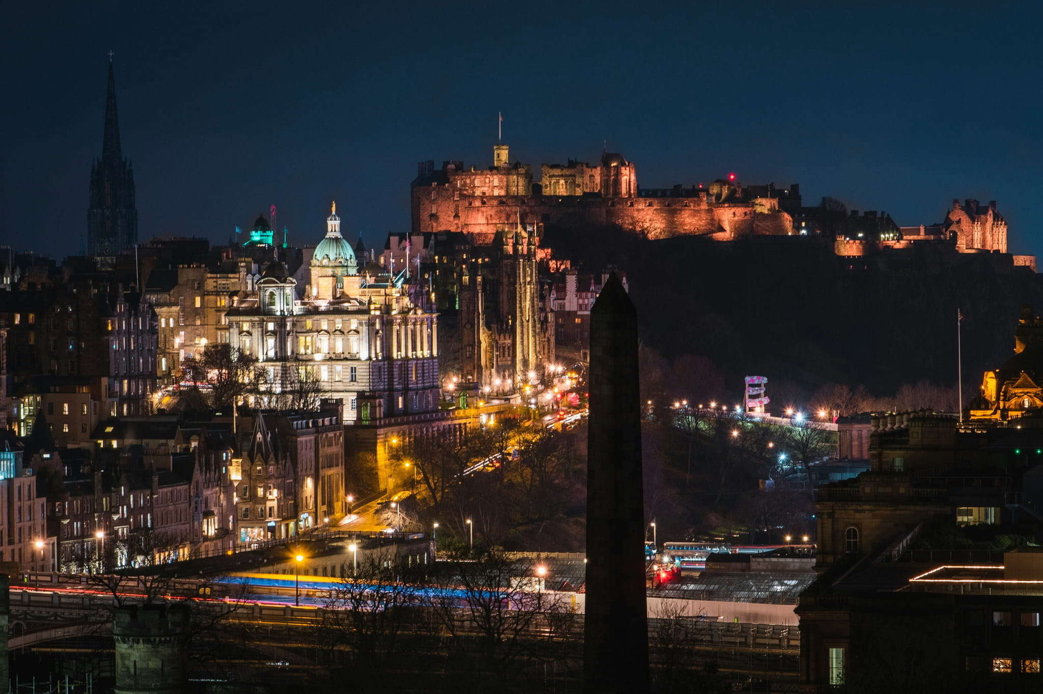 Edinburgh castle and building at night time.
