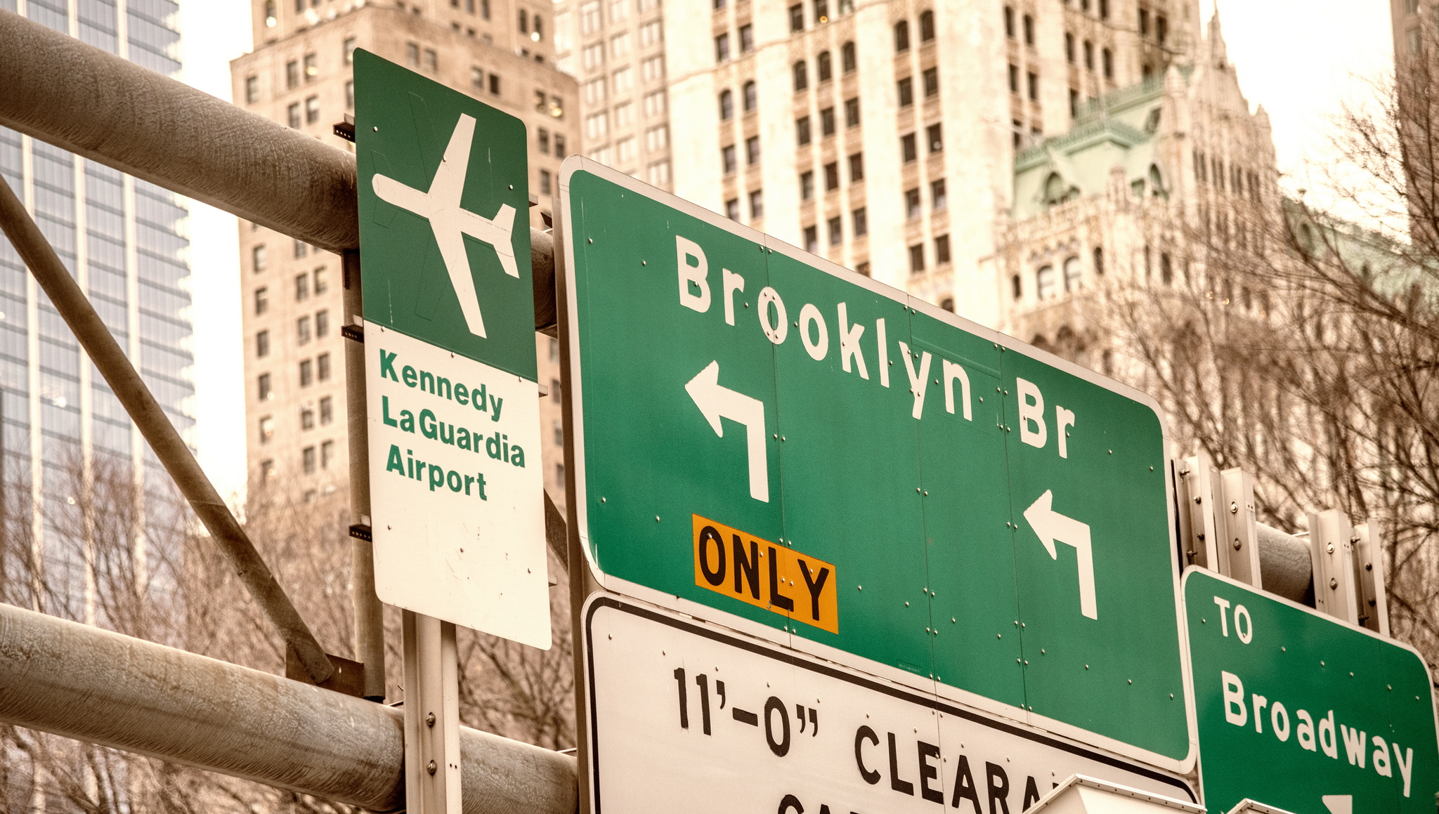 traffic sign indicating Kennedy LaGuardia airports. 